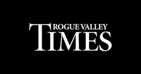 Logo, Text, Dynamite. Text: T TIMES ROGUE VALLEY