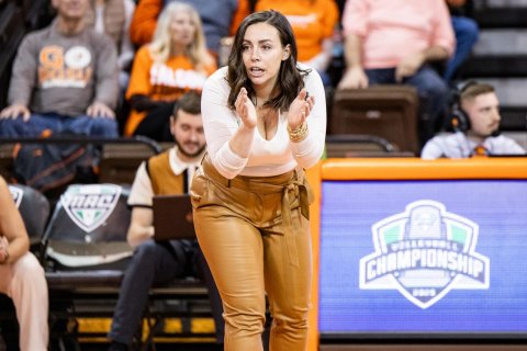 Adult, Person, Woman. Text: G CHAMPIONSHIP