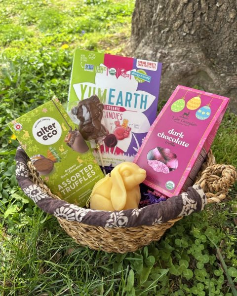 Fun, Person, Glove. Text: YUMEARTH ORGANIC CANDIES dark chocolate truffle alter eco ASSORTED TRUFFLES