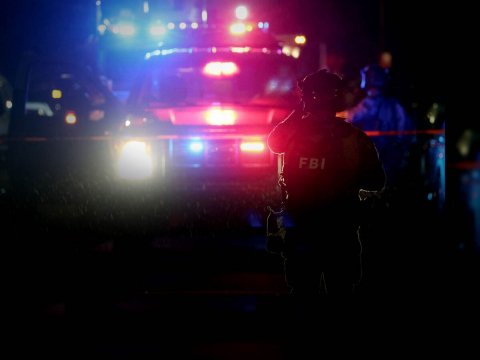 Lighting, Man, Person. Text: FBI