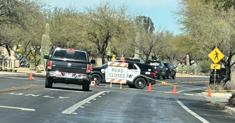 Road, License Plate, Utility Pole. Text: ROAD CLOSED :E