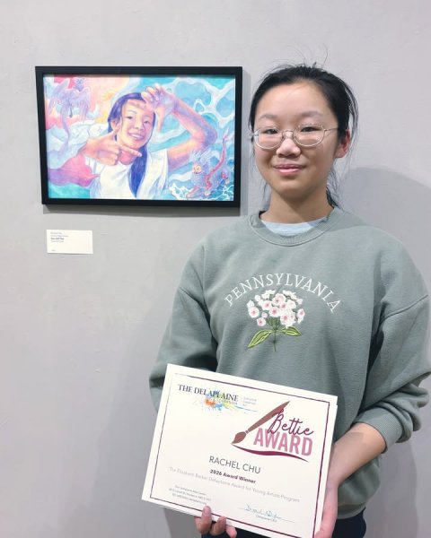 Glasses, Portrait, T-Shirt. Text: PENNSYLVANIA THE DELAPLAINE Bettie AWARD RACHEL CHU