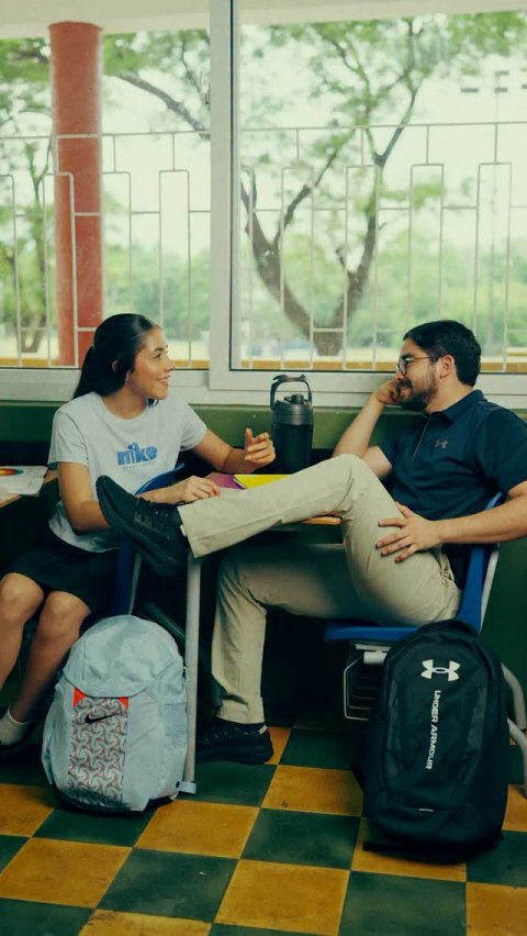 Portrait, Pants, Sitting. Text: UNDER ARMOUR nike