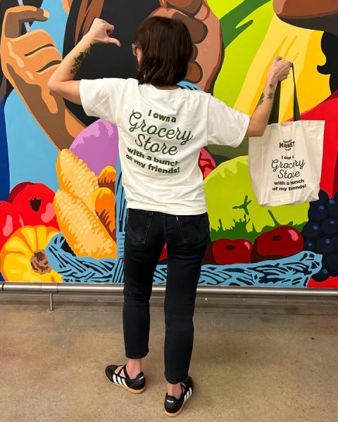 Pants, T-Shirt, Person. Text: Grocery Store with a bunch OF my friends!