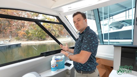 Yacht, Man, Person. Text: Kelly's Port