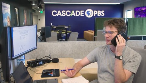 Table, Mobile Phone, Desk. Text: CASCADE PBS