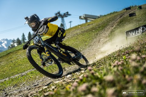 Slope, Mountain Bike, Helmet. Text: WHO 31 NATHAN HUGHES