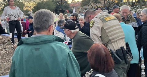 Adult, Person, Woman. Text: SHERIFF