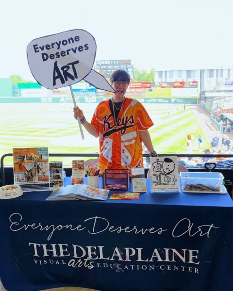 T-Shirt, Portrait, Advertisement. Text: Everyone Deserves ART Kleys THE DELAPLAINE VISUAL