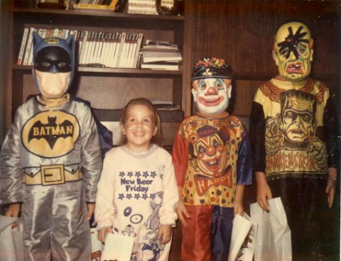 T-Shirt, Costume, Person. Text: BATMAN New Beer Friday HAPPY