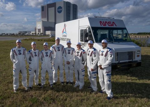 People, Person, Man. Text: NASA i 3 2 3 2