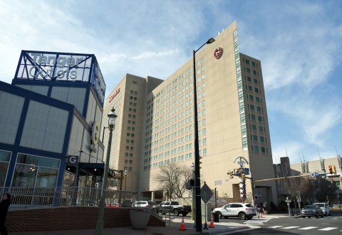 Office Building, City, Urban. Text: Tanger G
