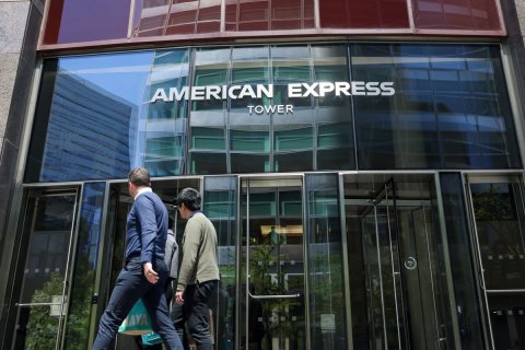 Office Building, Person, Door. Text: AMERICAN EXPRESS TOWER