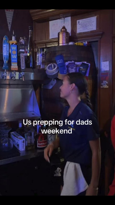 Person, Pub, Baseball Cap. Text: W KONA BIG WAVE W Us prepping for dads weekend
