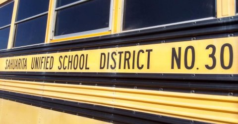 Bus, Vehicle, School Bus. Text: SAHUARITA UNIFIED SCHOOL DISTRICT NO. 30