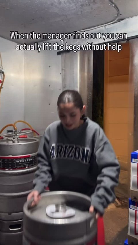 Adult, Man, Person. Text: When the manager finds out you can actually lift the kegs without help ARIZON WESTERN