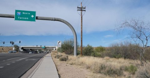 Road, Freeway, Utility Pole. Text: NORTH 19 Tucson