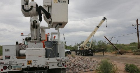 Construction, Construction Crane, Utility Pole. Text: EL 63300