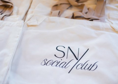 Bag, Tote Bag, Coat. Text: social