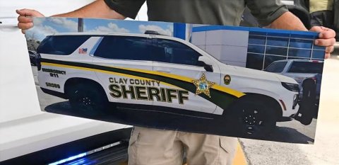 Car, Police Car, Vehicle. Text: - CLAY COUNTY SHERIFF