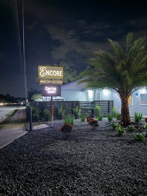 Hotel, Outdoors, Road. Text: ENCORE