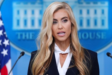 Blonde, Crowd, Microphone. Text: THE