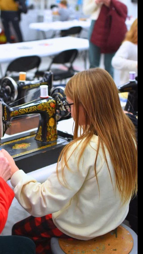 Person, Adult, Woman. Text: SINGER-