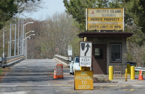 City, Road, Street. Text: TERMINAL PRIVATE PROPERTY SPEED LIMIT-15 MPH KEEP RIGHT BE PREPARED TO STOP